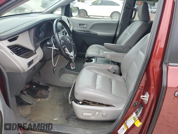 2015 Toyota Sienna XLE with VIN 5TDYK3DC1FS648469, listed as a Copart auction lot 57471975 with 118,567 mi miles and Non repairable. Bid and sale history available at DreamBid. Image 7.