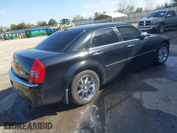 2005 Chrysler 300 with VIN 2C3AA63H65H145122, listed as a IAAI auction lot 41847043 with 237,757 mi miles. Bid and sale history available at carsss.com. Image 4.