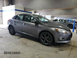 2013 Ford Focus SE with VIN 1FADP3F20DL250081, listed as a Copart auction lot 62140995 with 78,118 mi miles and Salvage title. Bid and sale history available at DreamBid. Image 4.