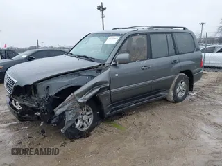 2000 Lexus LX 470 z VIN JT6HT00W8Y0092556, wystawiony jako IAAI lot #41727615 z przebiegiem 156 262 mil mil oraz . Historia ofert i sprzedaży dostępna na DreamBid. Obrazek 2.