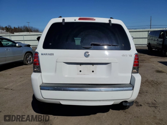 2005 Mercury Mariner Luxury z VIN 4M2CU57115DJ01538, wystawiony jako Copart lot #48695925 z przebiegiem Nie podano mil oraz Szkody całkowita. Historia ofert i sprzedaży dostępna na DreamBid. Obrazek 6.