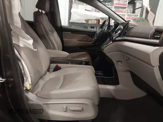 2018 Honda Odyssey Touring with VIN 5FNRL6H84JB041309, listed as a IAAI auction lot 42272247 with 90,371 mi miles and . Bid and sale history available at DreamBid. Image 5.