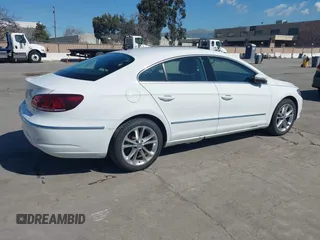 2016 Volkswagen CC Sport with VIN WVWBP7AN7GE500242, listed as a IAAI auction lot 41760893 with 42,401 mi miles. Bid and sale history available at carsss.com. Image 4.
