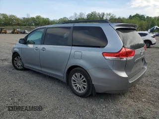 2011 Toyota Sienna XLE AAS with VIN 5TDYK3DC9BS130636, listed as a Copart auction lot 55068225 with 181,025 mi miles and Salvage Title. Bid and sale history available at DreamBid. Image 2.