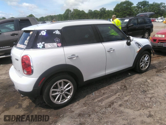 2015 MINI Countryman with VIN WMWZB3C52FWR46114, listed as a IAAI auction lot 42107741 with 110,022 mi miles and . Bid and sale history available at DreamBid. Image 4.