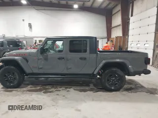 2021 Jeep Gladiator Mojave z VIN 1C6JJTEG5ML524829, wystawiony jako IAAI lot #42247982 z przebiegiem 20 158 mil mil oraz . Historia ofert i sprzedaży dostępna na DreamBid. Obrazek 14.