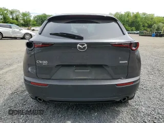 2021 Mazda CX-30 Preferred z VIN 3MVDMBCL1MM256818, wystawiony jako Copart lot #57885285 z przebiegiem 29 533 mil mil oraz Szkoda całkowita • Salvage title. Historia ofert i sprzedaży dostępna na DreamBid. Obrazek 6.