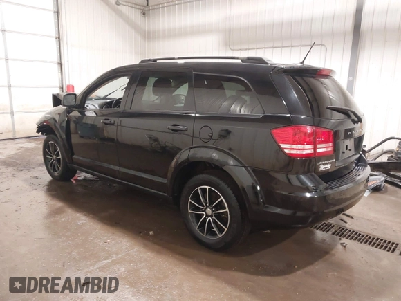 2017 Dodge Journey SE z VIN 3C4PDCAB4HT695490, wystawiony jako IAAI lot #41301719 z przebiegiem 103 642 mil mil oraz . Historia ofert i sprzedaży dostępna na DreamBid. Obrazek 3.