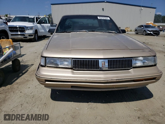 1993 Oldsmobile Cutlass Ciera S z VIN 1G3AG54NXP6422819, wystawiony jako Copart lot #65294504 z przebiegiem 180 835 mil mil oraz Szkoda całkowita • Salvage title. Historia ofert i sprzedaży dostępna na DreamBid. Obrazek 5.