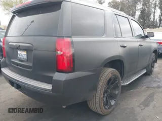 2018 Chevrolet Tahoe LT with VIN 1GNSCBKC5JR126474, listed as a IAAI auction lot 41896310 with 90,928 mi miles and . Bid and sale history available at DreamBid. Image 4.