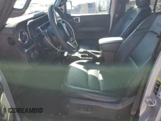 2024 Jeep Wrangler Sahara with VIN 1C4RJXP63RW195206, listed as a Copart auction lot 48784595 with 10,737 mi miles and Salvage Title. Bid and sale history available at DreamBid. Image 7.