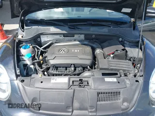2017 Volkswagen Beetle 1.8T SE with VIN 3VWJ17ATXHM612411, listed as a IAAI auction lot 41900371 with 101,419 mi miles. Bid and sale history available at carsss.com. Image 10.