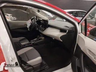 2023 Toyota Corolla Hybrid LE with VIN JTDBDMHE5P3006163, listed as a IAAI auction lot 40860436 with 60,137 mi miles. Bid and sale history available at carsss.com. Image 5.