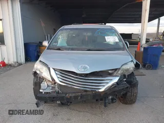 2016 Toyota Sienna LE with VIN 5TDJK3DC4GS133694, listed as a IAAI auction lot 41171171 with 99,680 mi miles. Bid and sale history available at carsss.com. Image 12.
