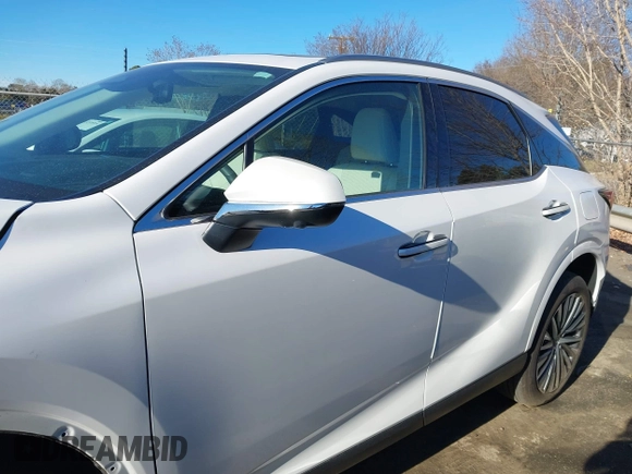 2023 Lexus RX 350 with VIN 2T2BAMCA3PC016934, listed as a IAAI auction lot 41465245 with 11,976 mi miles and . Bid and sale history available at DreamBid. Image 14.