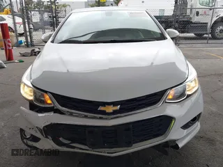 2018 Chevrolet Cruze LS with VIN 1G1BC5SM0J7229860, listed as a IAAI auction lot 41916807 with 94,391 mi miles and . Bid and sale history available at DreamBid. Image 6.