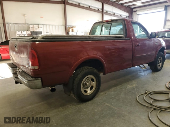 1999 Ford F-150 with VIN 1FTRF18W8XNB97257, listed as a Copart auction lot 87857815 with Not provided miles and Salvage title. Bid and sale history available at DreamBid. Image 3.