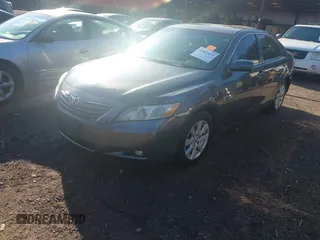 2009 Toyota Camry LE with VIN 4T1BK46K79U088078, listed as a IAAI auction lot 41821115 with 157,665 mi miles. Bid and sale history available at carsss.com. Image 2.