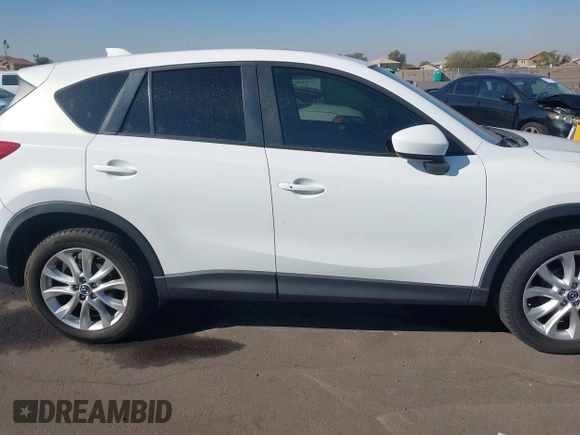 2014 Mazda CX-5 Grand Touring with VIN JM3KE4DY4E0375809, listed as a IAAI auction lot 41468078 with 151,226 mi miles. Bid and sale history available at carsss.com. Image 13.