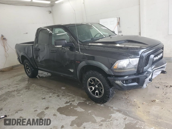 2016 Ram 1500 Rebel with VIN 1C6RR7YT6GS105815, listed as a Copart auction lot 54253235 with 150,511 mi miles and Salvage title. Bid and sale history available at DreamBid. Image 4.