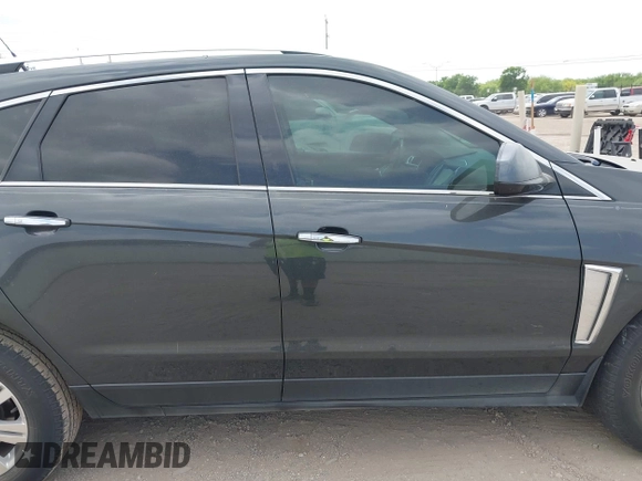 2014 Cadillac SRX Luxury Collection with VIN 3GYFNBE33ES599058, listed as a IAAI auction lot 42080556 with 128,917 mi miles. Bid and sale history available at carsss.com. Image 13.