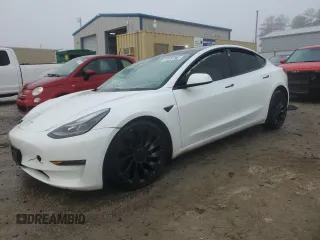 2021 Tesla Model 3 Performance with VIN 5YJ3E1ECXMF984417, listed as a Copart auction lot 48465675 with 60,838 mi miles and Clean Title. Bid and sale history available at DreamBid. Image 1.