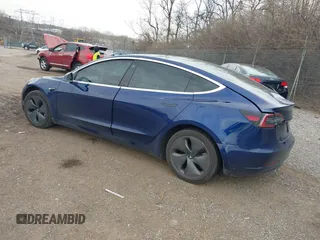 2018 Tesla Model 3 Long Range Battery with VIN 5YJ3E1EB2JF056166, listed as a IAAI auction lot 41847972 with 126,126 mi miles and . Bid and sale history available at DreamBid. Image 3.