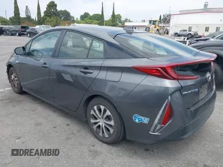 2021 Toyota Prius LE with VIN JTDKAMFP0M3193305, listed as a IAAI auction lot 42283494 with 322,523 mi miles and . Bid and sale history available at DreamBid. Image 3.