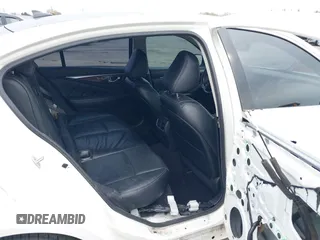 2014 Infiniti Q50 Premium z VIN JN1BV7AP8EM671403, wystawiony jako IAAI lot #41837716 z przebiegiem 115 058 mil mil oraz . Historia ofert i sprzedaży dostępna na DreamBid. Obrazek 8.