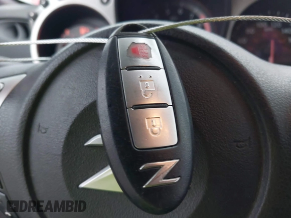 2016 Nissan 370Z z VIN JN1AZ4EHXGM932681, wystawiony jako IAAI lot #42350850 z przebiegiem 94 586 mil mil oraz . Historia ofert i sprzedaży dostępna na DreamBid. Obrazek 11.