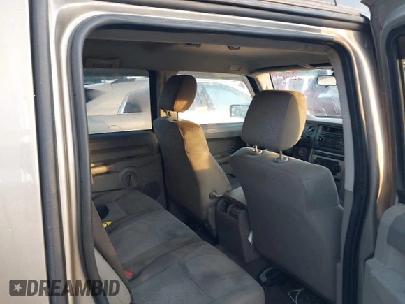 2006 Jeep Commander z VIN 1J8HG48N26C181057, wystawiony jako IAAI lot #42548737 z przebiegiem 244 773 mil mil oraz . Historia ofert i sprzedaży dostępna na DreamBid. Obrazek 8.