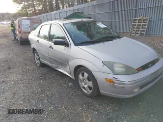 2004 Ford Focus ZTS with VIN 1FAFP38Z74W154059, listed as a IAAI auction lot 41695294 with 146,270 mi miles and . Bid and sale history available at carsss.com. Image 1.