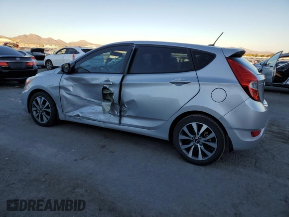 2015 Hyundai Accent Sport with VIN KMHCU5AE0FU201483, listed as a Copart auction lot 80882664 with 66,292 mi miles and Salvage Title. Bid and sale history available at carsss.com. Image 2.