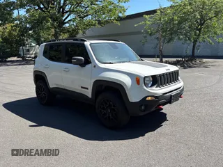 2017 Jeep Renegade Trailhawk with VIN ZACCJBCB6HPE79727, listed as a Copart auction lot 64074965 with 90,651 mi miles and Salvage title. Bid and sale history available at DreamBid. Image 1.