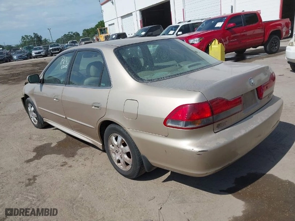 2002 Honda Accord Sdn SE with VIN 1HGCG66812A155003, listed as a IAAI auction lot 41934724 with 192,129 mi miles. Bid and sale history available at carsss.com. Image 3.