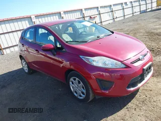 2011 Ford Fiesta SE with VIN 3FADP4EJ8BM162714, listed as a IAAI auction lot 42082103 with 128,876 mi miles. Bid and sale history available at carsss.com. Image 1.
