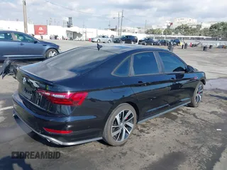 2021 Volkswagen Jetta GLI S with VIN 3VW6T7BU7MM002015, listed as a IAAI auction lot 41349898 with 44,416 mi miles and . Bid and sale history available at DreamBid. Image 4.