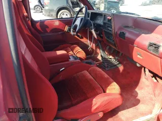 1989 Ford Ranger Splash with VIN 1FTCR10A2KUB58322, listed as a Copart auction lot 77710394 with 890,534 mi miles and Salvage Title. Bid and sale history available at DreamBid. Image 11.