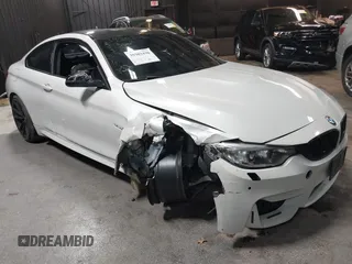 2017 BMW M4 with VIN WBS3R9C5XHK709445, listed as a IAAI auction lot 39303430 with 59,095 mi miles. Bid and sale history available at carsss.com. Image 1.