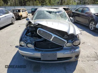2004 Jaguar X-Type with VIN SAJEA51C04WD91344, listed as a Copart auction lot 49979285 with Not Provided miles and Salvage Title. Bid and sale history available at DreamBid. Image 5.