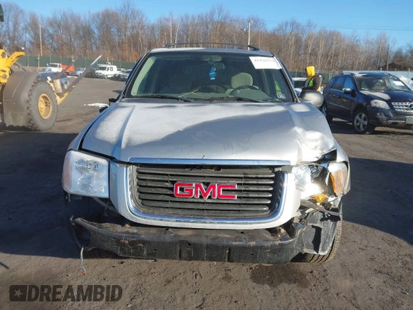2005 GMC Envoy SLE with VIN 1GKDT13S452194933, listed as a IAAI auction lot 41426512 with 176,897 mi miles. Bid and sale history available at carsss.com. Image 12.