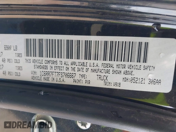 2015 Ram 1500 Tradesman with VIN 1C6RR7FT7FS706667, listed as a IAAI auction lot 41899212 with 148,358 mi miles and . Bid and sale history available at DreamBid. Image 9.