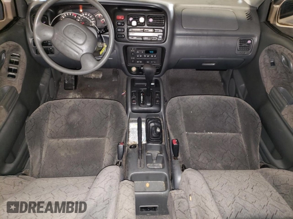2002 Chevrolet Tracker LT z VIN 2CNBJ634126927635, wystawiony jako Copart lot #78814333 z przebiegiem 224 726 mil mil oraz Szkoda całkowita • Salvage title. Historia ofert i sprzedaży dostępna na DreamBid. Obrazek 8.