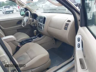 2006 Ford Escape XLT с VIN 1FMYU03146KB11557, выставлен на аукционе IAAI как лот 42433122 с пробегом 127 080 миль миль и . История ставок и продаж доступна на DreamBid. Изображение 5.