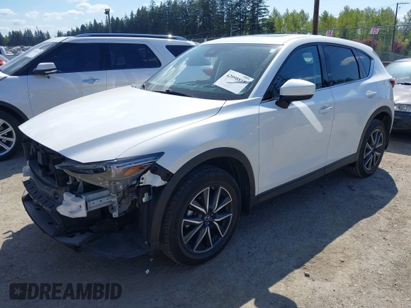 2017 Mazda CX-5 Grand Touring with VIN JM3KFBDL9H0163031, listed as a IAAI auction lot 42098819 with 81,781 mi miles. Bid and sale history available at carsss.com. Image 18.