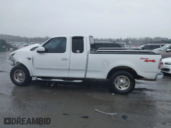 1999 Ford F-150 XL with VIN 1FTRX18L6XNB48352, listed as a IAAI auction lot 41717057 with 171,654 mi miles. Bid and sale history available at carsss.com. Image 15.