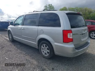 2011 Chrysler Town & Country Touring with VIN 2A4RR5DG4BR682109, listed as a IAAI auction lot 42189832 with 208,709 mi miles and . Bid and sale history available at DreamBid. Image 3.