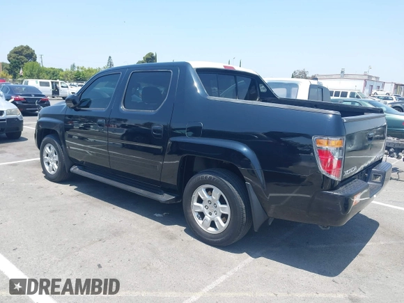 2006 Honda Ridgeline RTL with VIN 2HJYK16576H566002, listed as a IAAI auction lot 42595698 with 212,637 mi miles and . Bid and sale history available at DreamBid. Image 3.