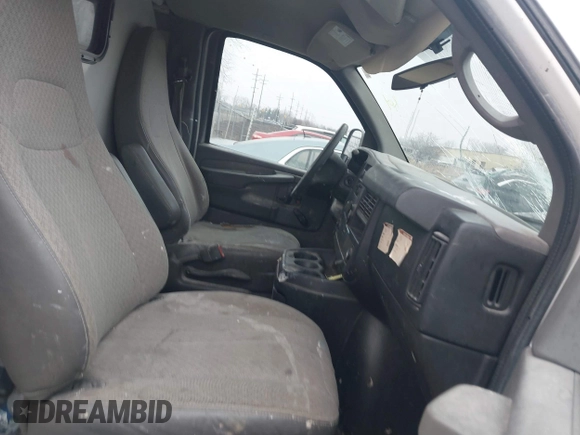2012 Chevrolet Express Cargo Van with VIN 1GCSGAFX4C1115813, listed as a IAAI auction lot 41197972 with 331,376 mi miles. Bid and sale history available at carsss.com. Image 5.