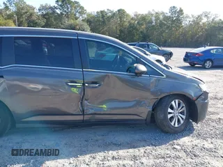 2016 Honda Odyssey EX-L with VIN 5FNRL5H65GB022236, listed as a IAAI auction lot 40761542 with 236,979 mi miles. Bid and sale history available at carsss.com. Image 6.